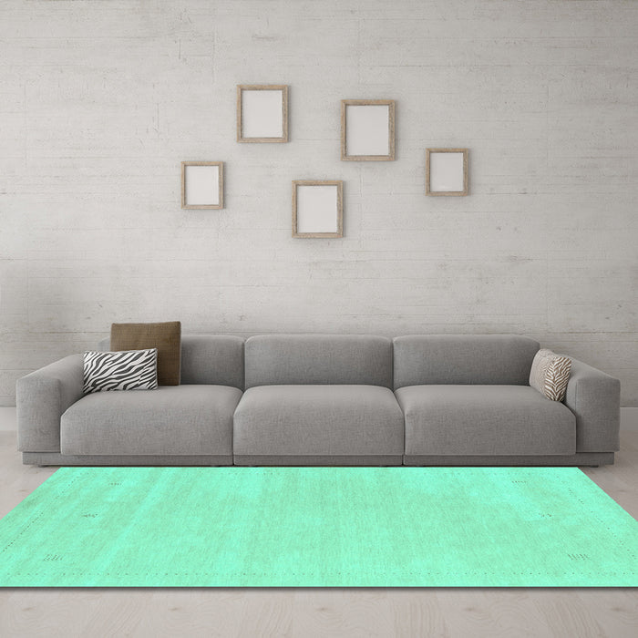 Machine Washable Solid Turquoise Modern Area Rugs in a Living Room,, wshcon2516turq