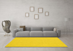 Machine Washable Solid Yellow Modern Rug in a Living Room, wshcon251yw
