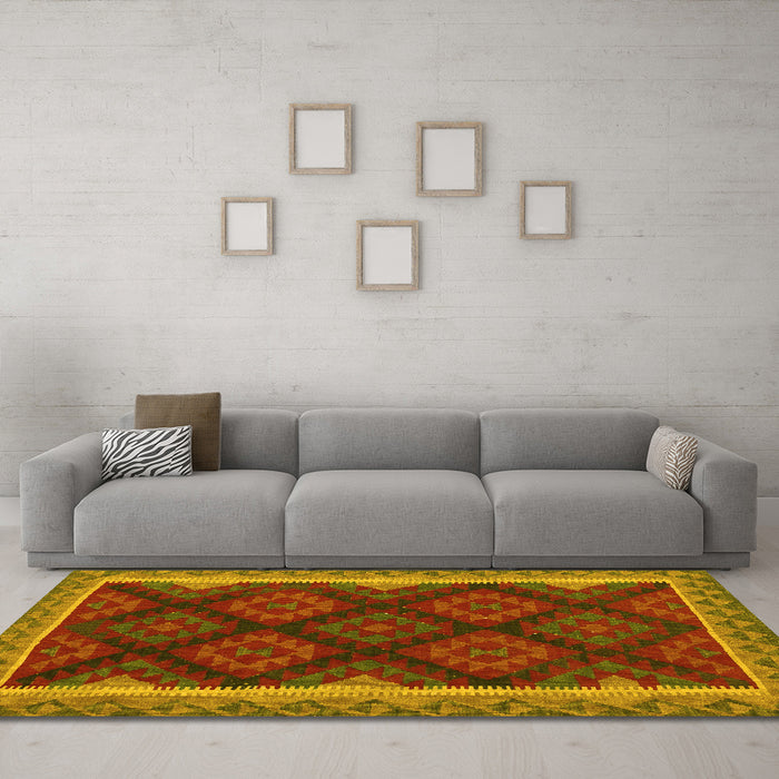 Machine Washable Oriental Yellow Traditional Rug in a Living Room, wshcon2546yw