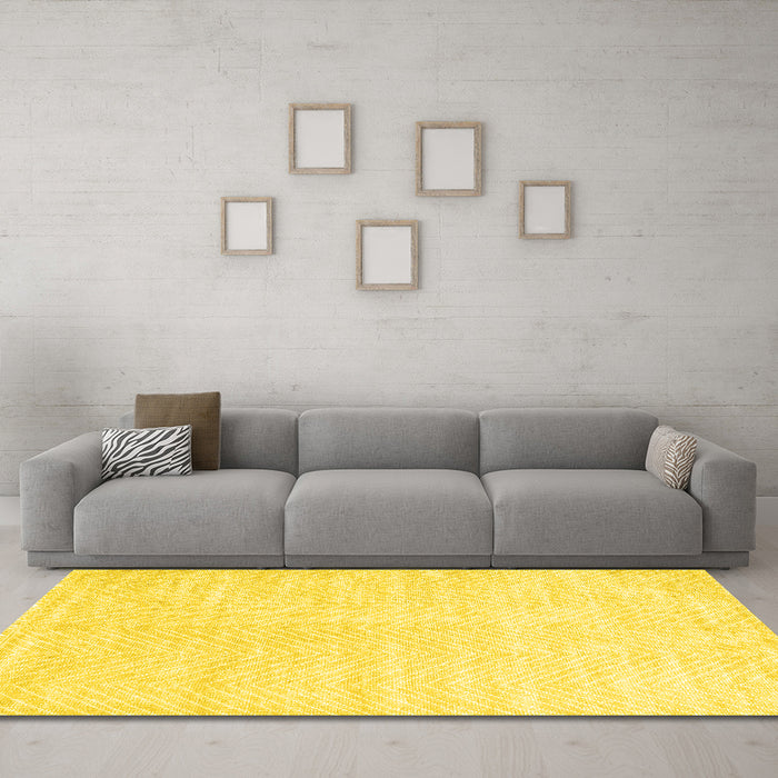 Machine Washable Solid Yellow Modern Rug in a Living Room, wshcon2553yw