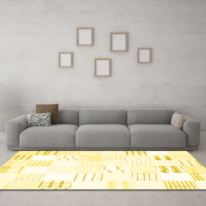 Machine Washable Solid Yellow Modern Rug in a Living Room, wshcon255yw