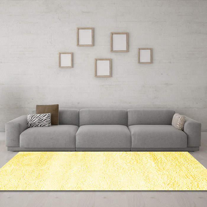 Machine Washable Solid Yellow Modern Rug in a Living Room, wshcon2560yw