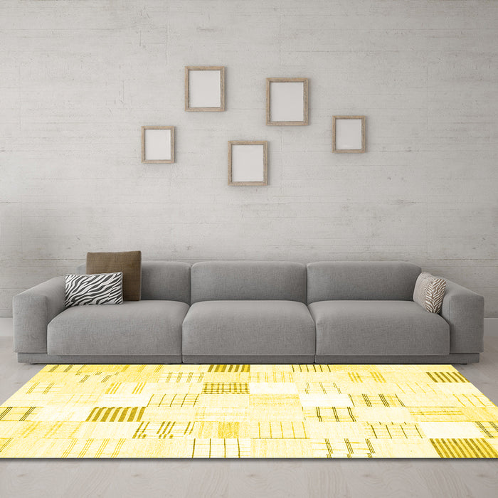 Machine Washable Solid Yellow Modern Rug in a Living Room, wshcon256yw