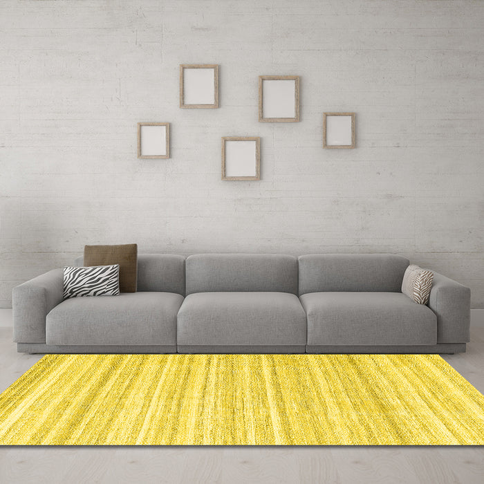 Machine Washable Solid Yellow Modern Rug in a Living Room, wshcon2578yw