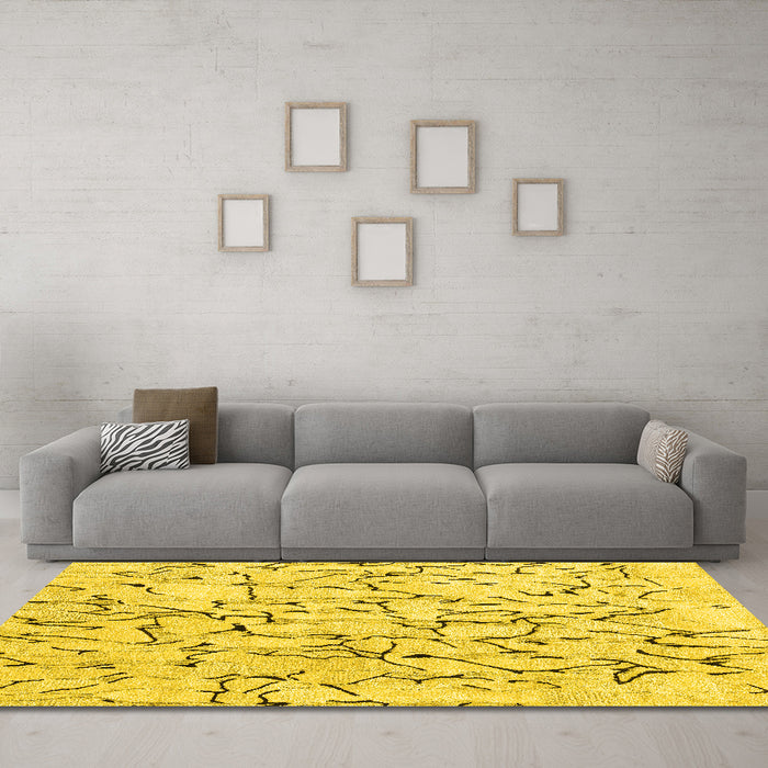 Machine Washable Solid Yellow Modern Rug in a Living Room, wshcon2591yw