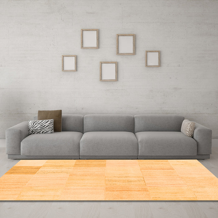 Machine Washable Solid Orange Modern Area Rugs in a Living Room, wshcon2597org