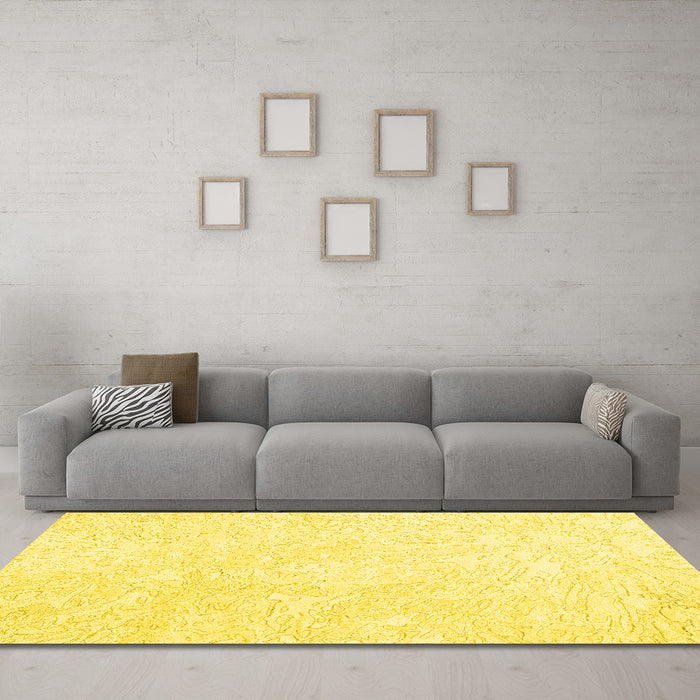 Machine Washable Solid Yellow Modern Rug in a Living Room, wshcon2598yw