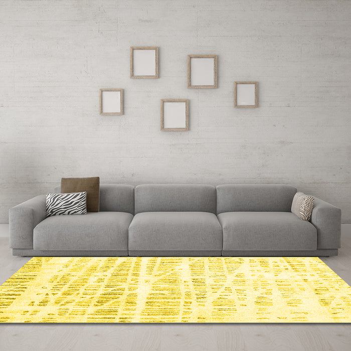 Machine Washable Solid Yellow Modern Rug in a Living Room, wshcon2599yw