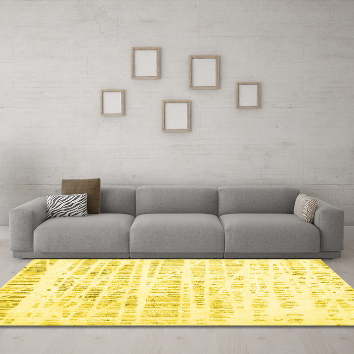 Machine Washable Solid Yellow Modern Rug in a Living Room, wshcon2600yw