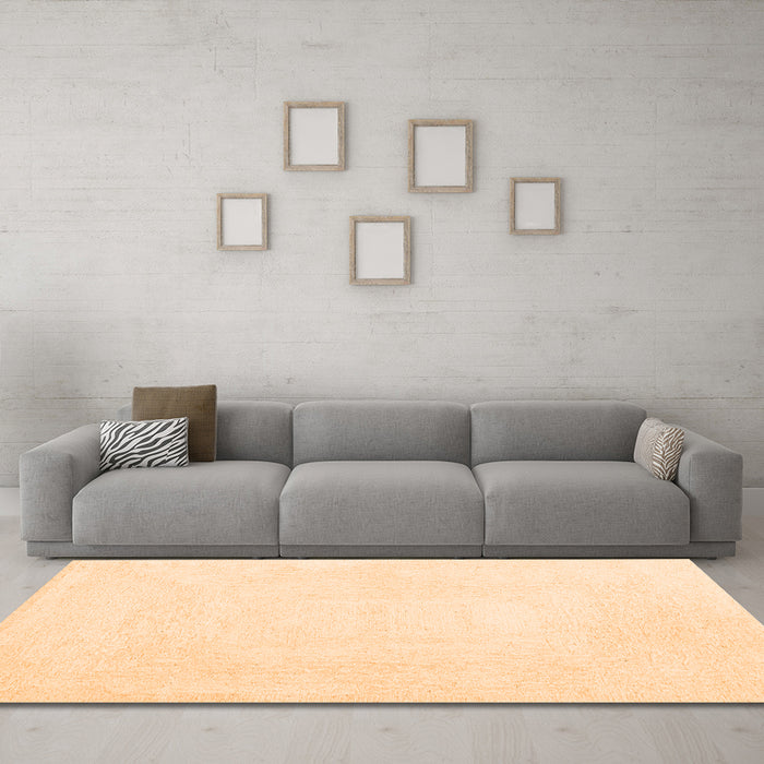 Machine Washable Solid Orange Modern Area Rugs in a Living Room, wshcon2608org