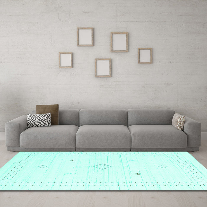 Machine Washable Solid Turquoise Modern Area Rugs in a Living Room,, wshcon2611turq