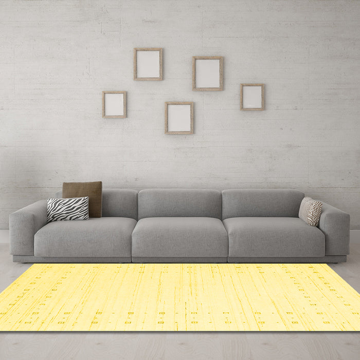 Machine Washable Solid Yellow Modern Rug in a Living Room, wshcon2612yw