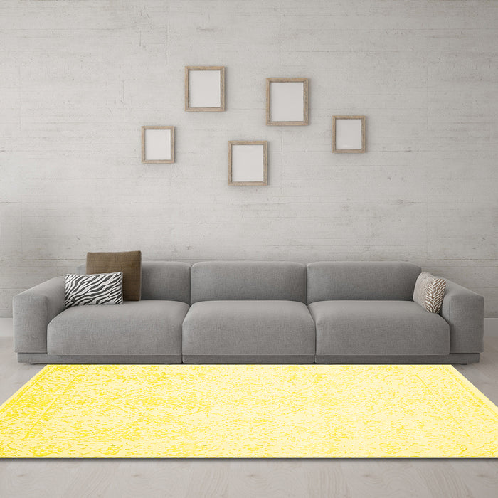 Machine Washable Solid Yellow Modern Rug in a Living Room, wshcon263yw