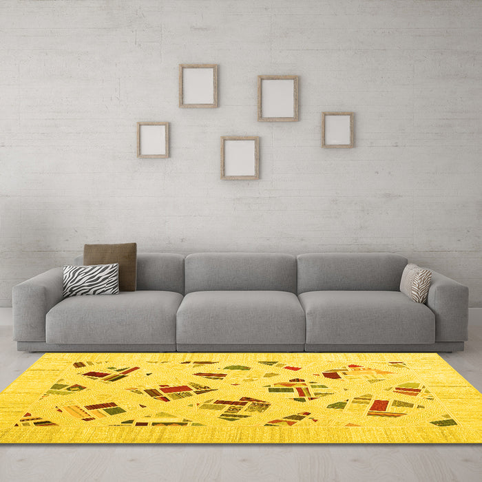 Machine Washable Solid Yellow Modern Rug in a Living Room, wshcon2641yw