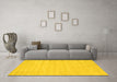 Machine Washable Solid Yellow Modern Rug in a Living Room, wshcon2650yw