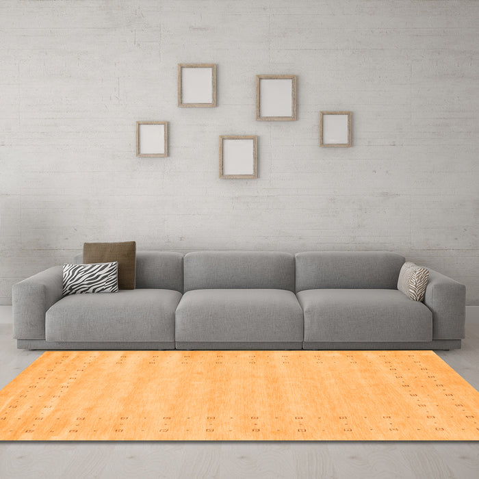 Machine Washable Solid Orange Modern Area Rugs in a Living Room, wshcon2650org
