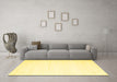 Machine Washable Solid Yellow Modern Rug in a Living Room, wshcon2652yw