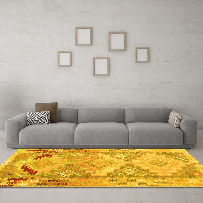 Machine Washable Southwestern Yellow Country Rug in a Living Room, wshcon2677yw