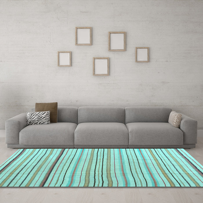Machine Washable Solid Light Blue Modern Rug in a Living Room, wshcon2679lblu