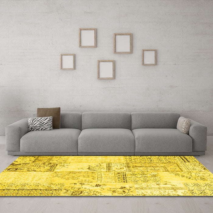Machine Washable Patchwork Yellow Transitional Rug in a Living Room, wshcon2691yw
