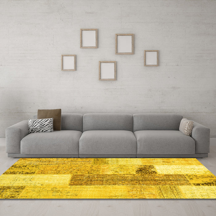 Machine Washable Patchwork Yellow Transitional Rug in a Living Room, wshcon2700yw
