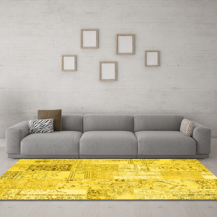 Machine Washable Patchwork Yellow Transitional Rug in a Living Room, wshcon2702yw