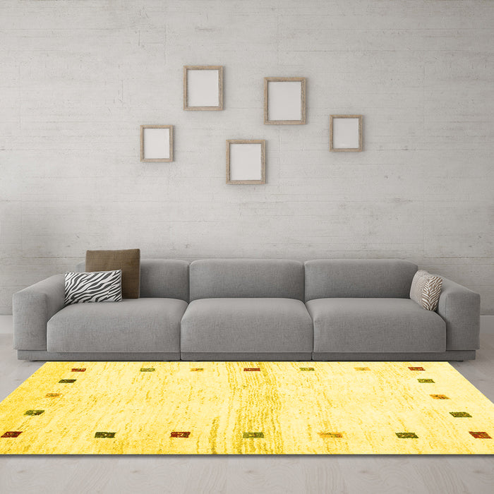 Machine Washable Solid Yellow Modern Rug in a Living Room, wshcon2718yw