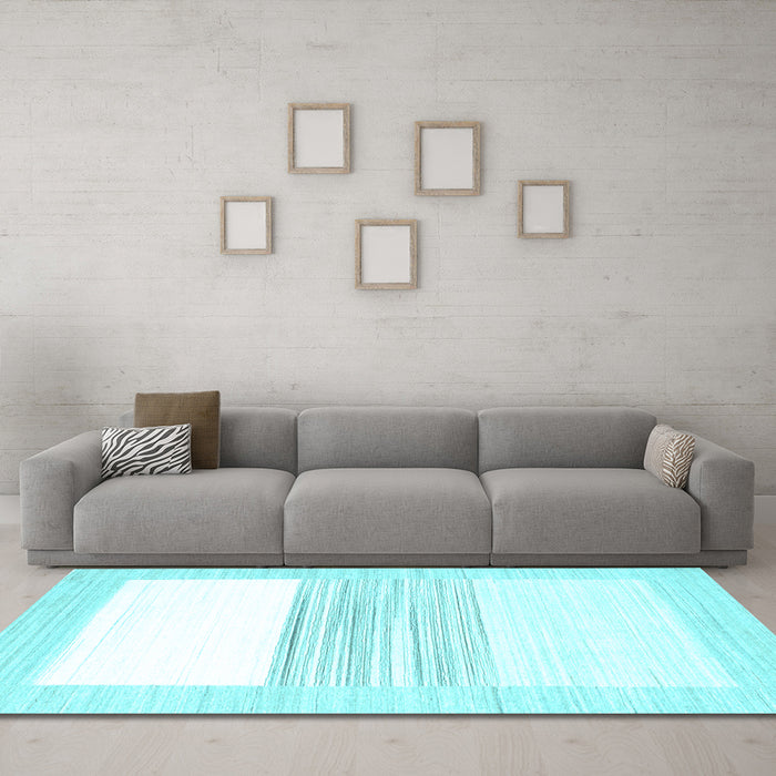 Machine Washable Solid Light Blue Modern Rug in a Living Room, wshcon271lblu