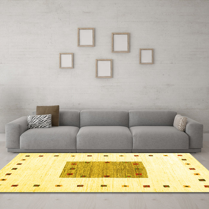 Machine Washable Solid Yellow Modern Rug in a Living Room, wshcon2722yw