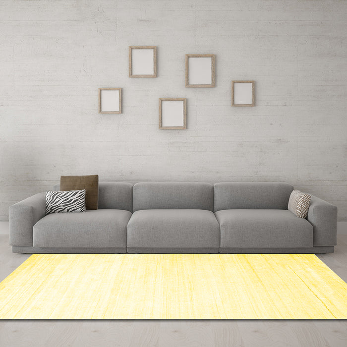 Machine Washable Solid Yellow Modern Rug in a Living Room, wshcon272yw