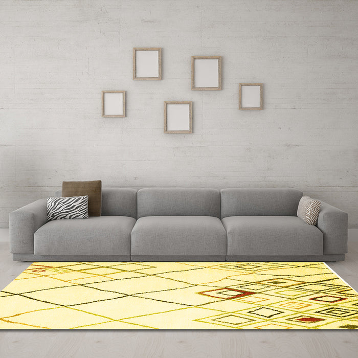 Machine Washable Solid Yellow Modern Rug in a Living Room, wshcon2733yw