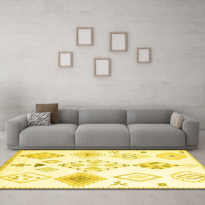 Machine Washable Solid Yellow Modern Rug in a Living Room, wshcon2746yw