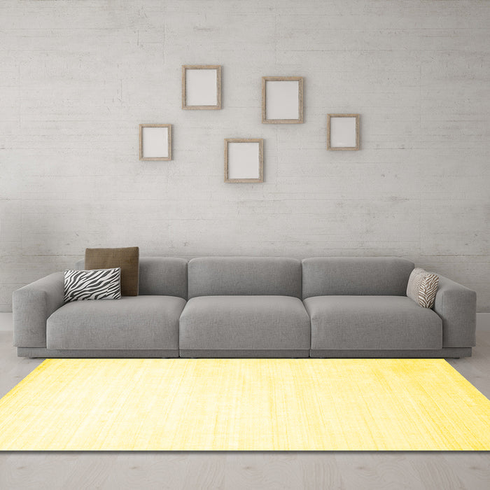 Machine Washable Solid Yellow Modern Rug in a Living Room, wshcon274yw