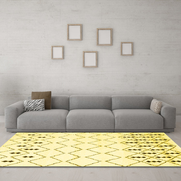 Machine Washable Solid Yellow Modern Rug in a Living Room, wshcon2753yw