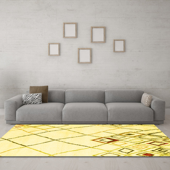 Machine Washable Solid Yellow Modern Rug in a Living Room, wshcon2755yw