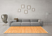 Machine Washable Solid Orange Modern Area Rugs in a Living Room, wshcon277org