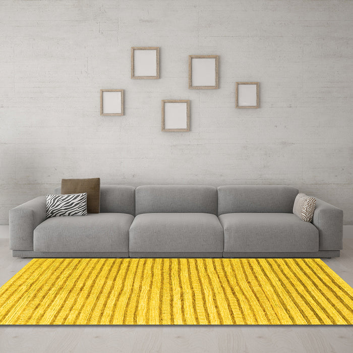 Machine Washable Solid Yellow Modern Rug in a Living Room, wshcon277yw