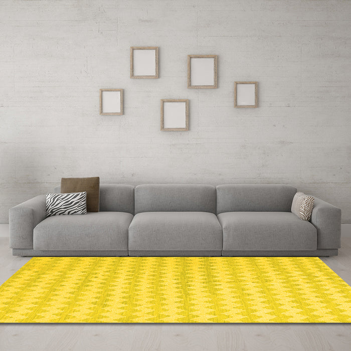 Machine Washable Solid Yellow Modern Rug in a Living Room, wshcon2786yw