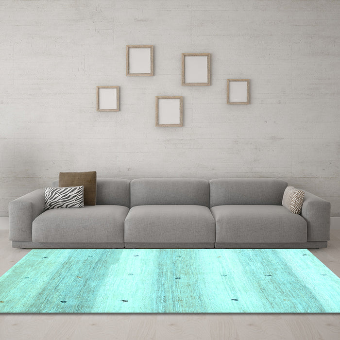 Machine Washable Solid Light Blue Modern Rug in a Living Room, wshcon2798lblu