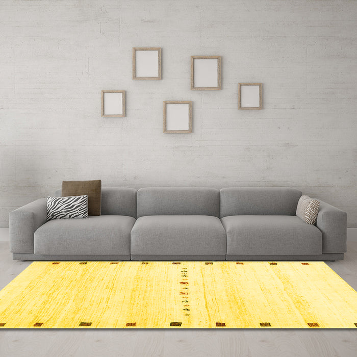 Machine Washable Solid Yellow Modern Rug in a Living Room, wshcon2812yw