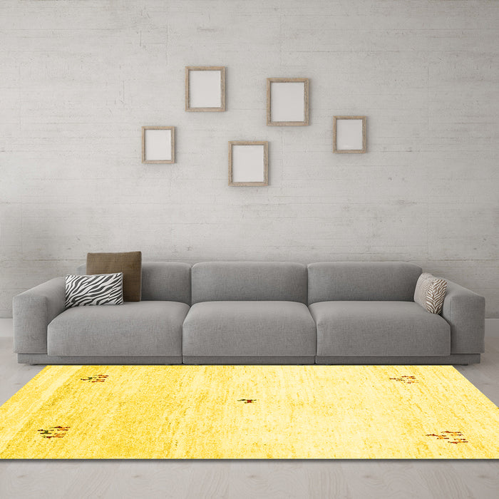 Machine Washable Solid Yellow Modern Rug in a Living Room, wshcon2813yw