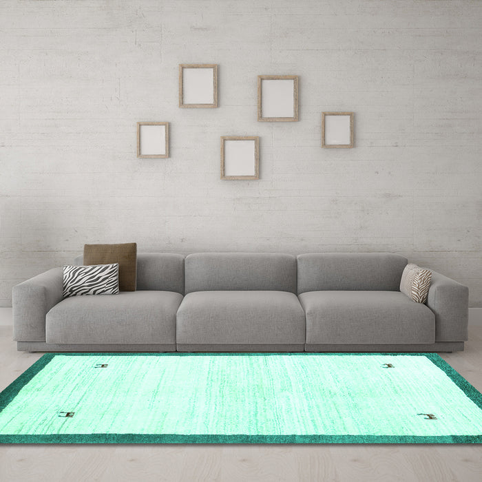 Machine Washable Solid Turquoise Modern Area Rugs in a Living Room,, wshcon2815turq