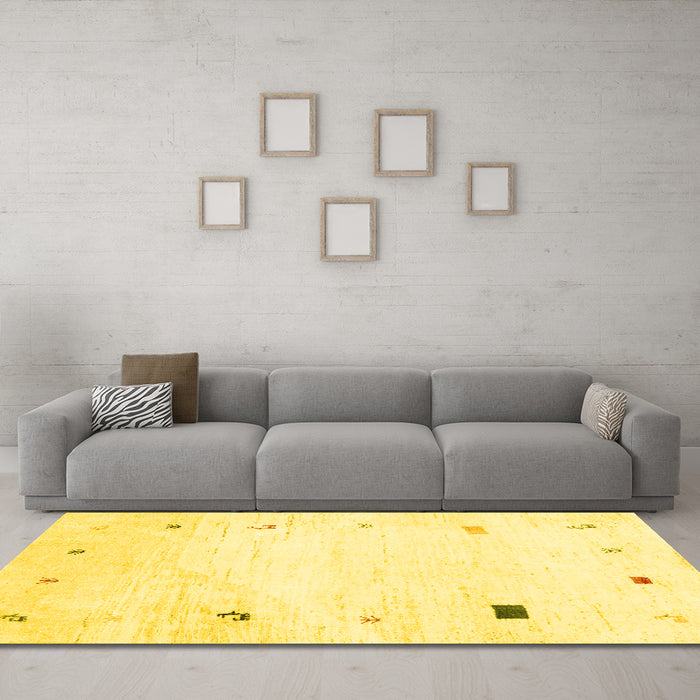 Machine Washable Solid Yellow Modern Rug in a Living Room, wshcon2817yw