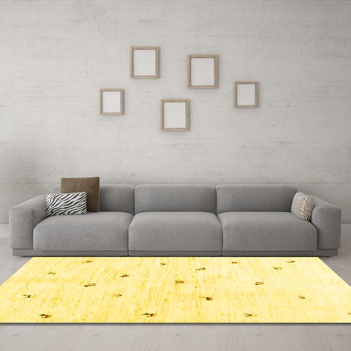 Machine Washable Solid Yellow Modern Rug in a Living Room, wshcon2840yw