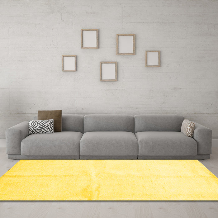 Machine Washable Solid Yellow Modern Rug in a Living Room, wshcon2855yw