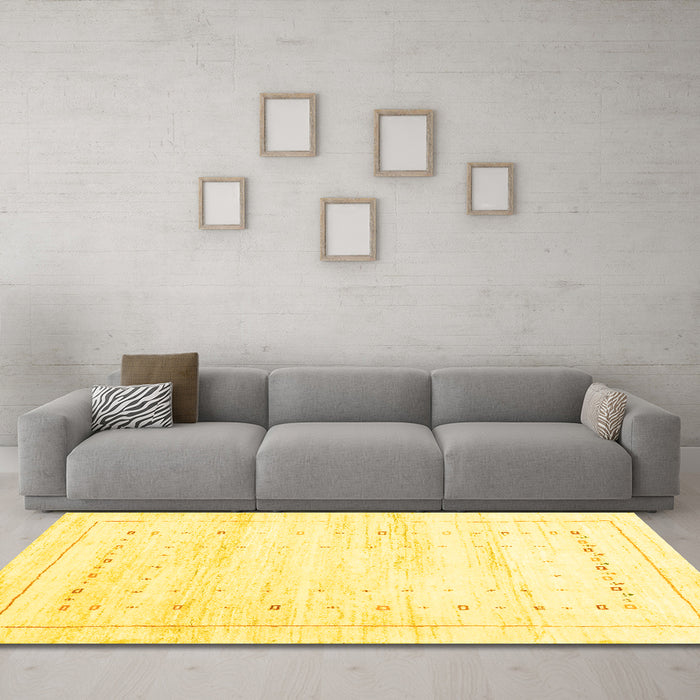 Machine Washable Solid Yellow Modern Rug in a Living Room, wshcon2864yw