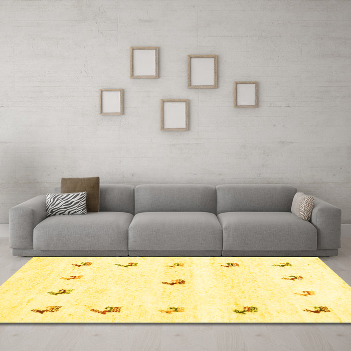 Machine Washable Solid Yellow Modern Rug in a Living Room, wshcon2871yw