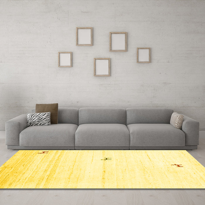 Machine Washable Solid Yellow Modern Rug in a Living Room, wshcon2884yw
