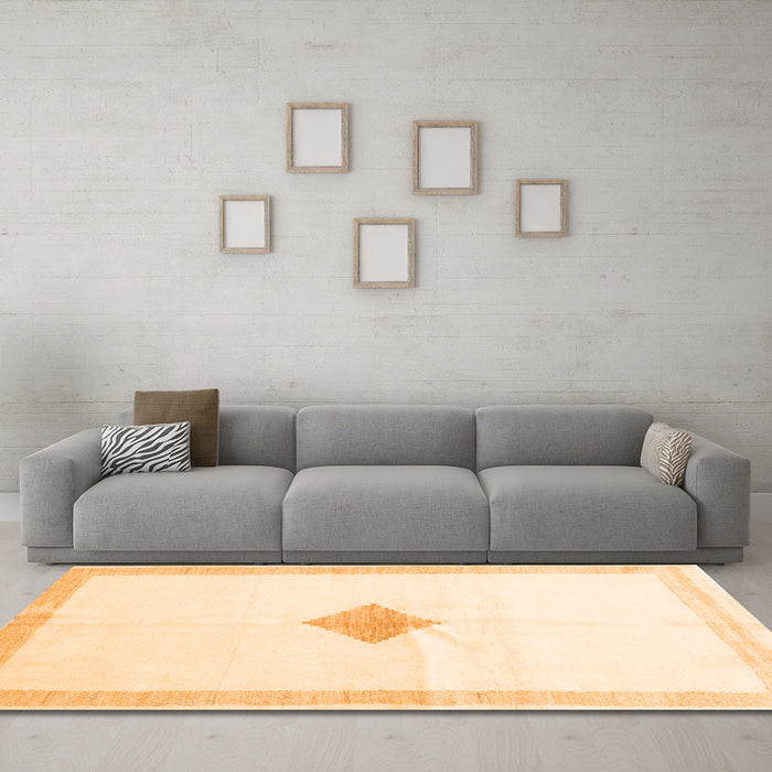 Machine Washable Solid Orange Modern Area Rugs in a Living Room, wshcon2891org