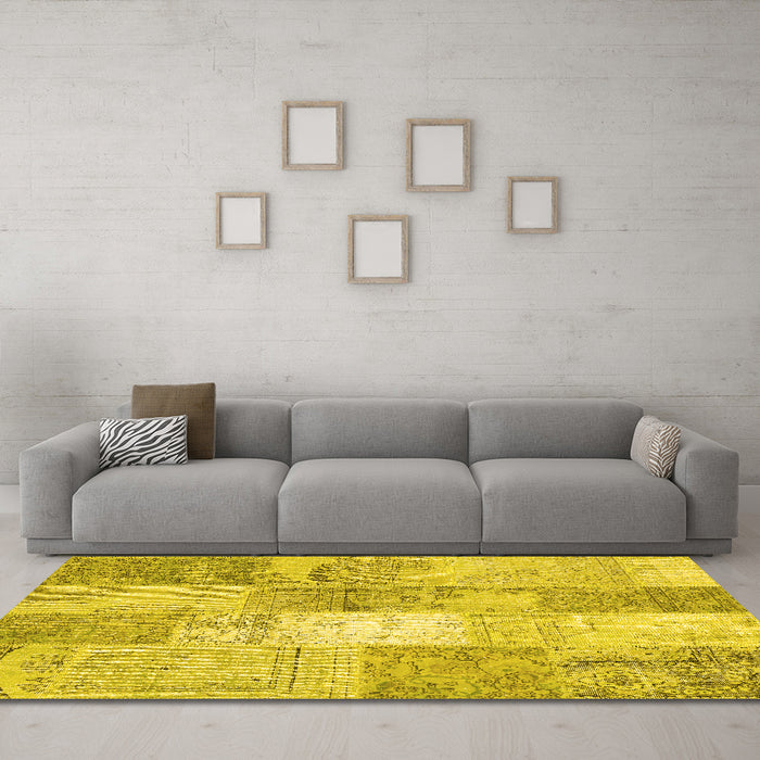 Machine Washable Patchwork Yellow Transitional Rug in a Living Room, wshcon2910yw